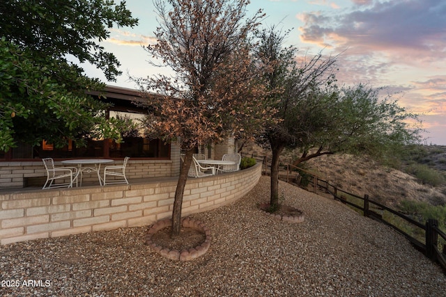 27610 W Gill Rd, Morristown, AZ 85342 - yard at dusk featuring a patio