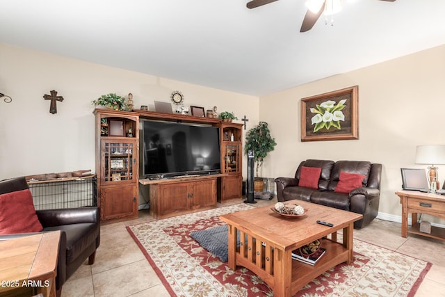 tiled living room with ceiling fan