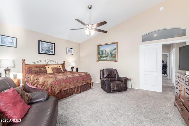 carpeted bedroom with ceiling fan and lofted ceiling