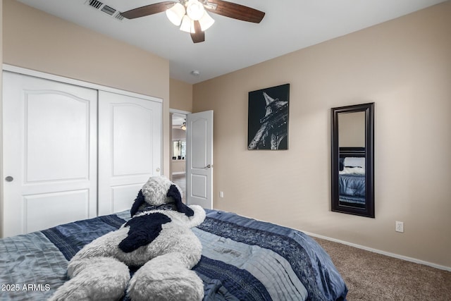 bedroom with carpet flooring, ceiling fan, and a closet