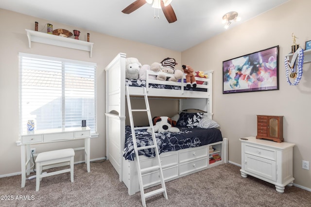 bedroom featuring light carpet and ceiling fan