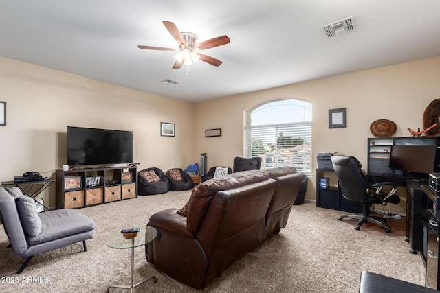 living room with light carpet and ceiling fan