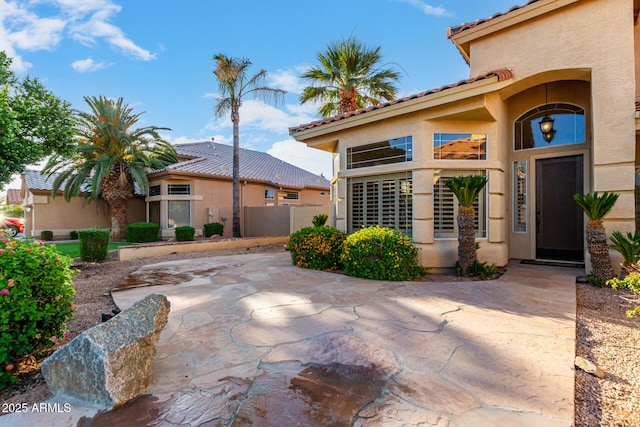 exterior space with a patio area