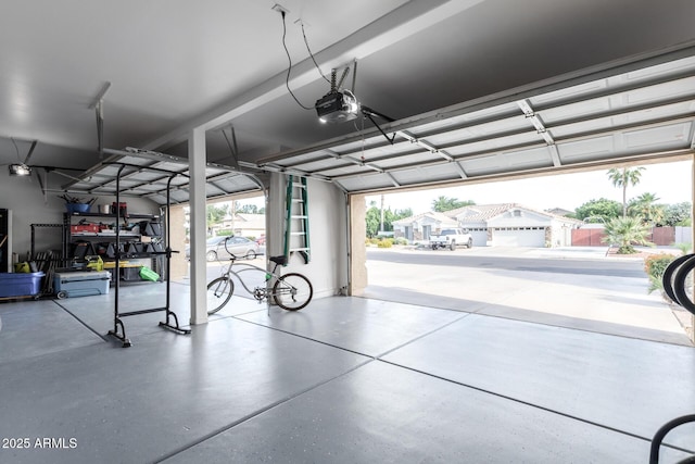 garage featuring a garage door opener