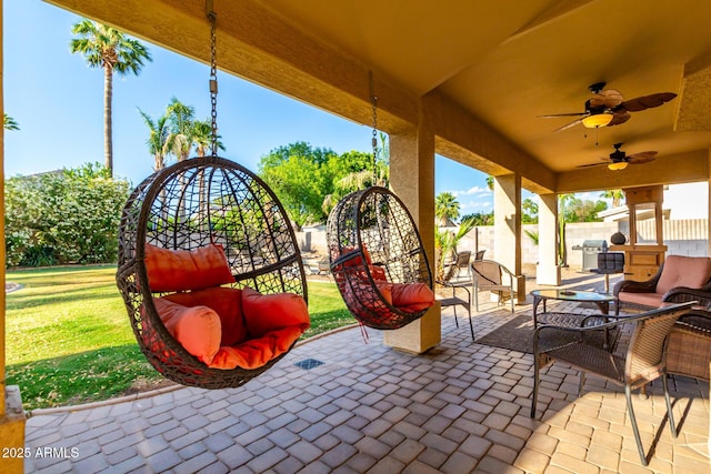 view of patio featuring ceiling fan and an outdoor hangout area