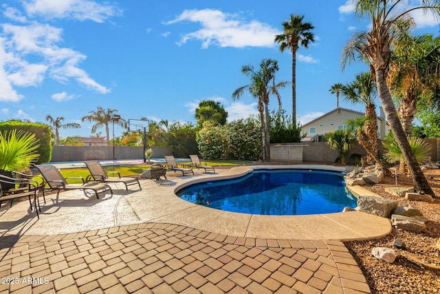 view of swimming pool featuring a patio