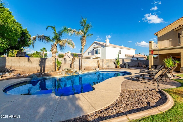 view of swimming pool featuring a patio area