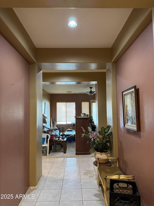 hallway featuring light tile patterned flooring