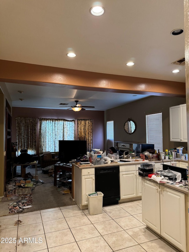 kitchen featuring white cabinets, black dishwasher, ceiling fan, and light tile patterned flooring