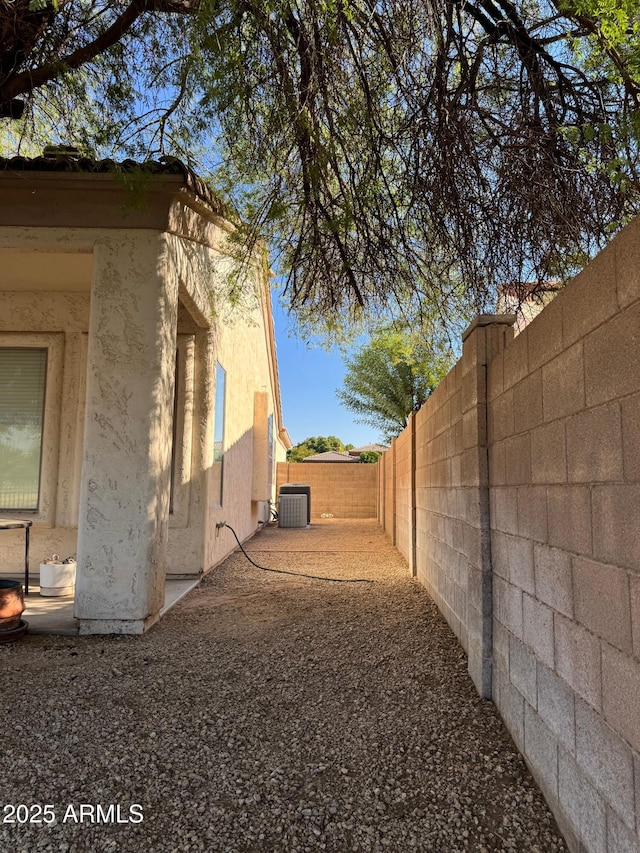 view of yard with central AC