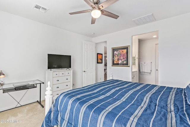 carpeted bedroom with visible vents and a ceiling fan