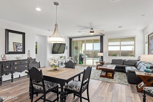 dining space with recessed lighting, visible vents, wood finished floors, and a ceiling fan