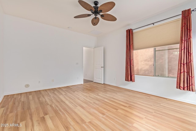 unfurnished room featuring ceiling fan and light hardwood / wood-style floors