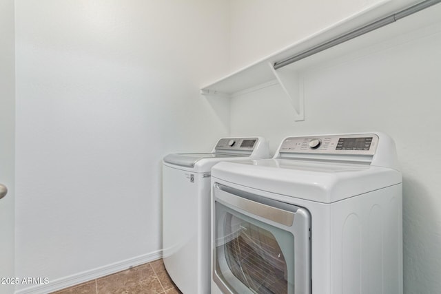 laundry area featuring washer and clothes dryer