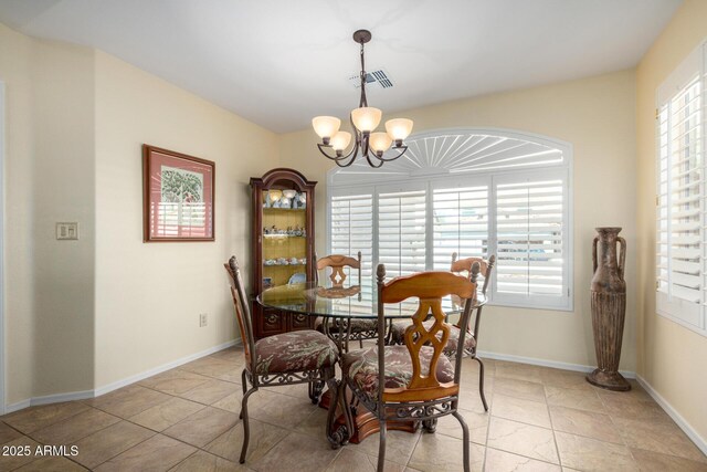 dining room featuring visible vents, baseboards, and an inviting chandelier