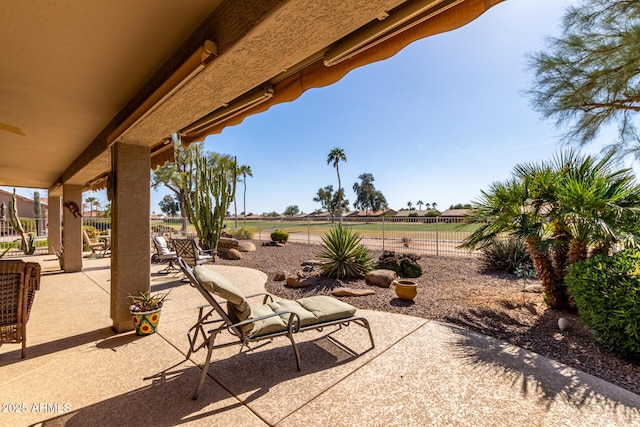 view of patio / terrace with fence