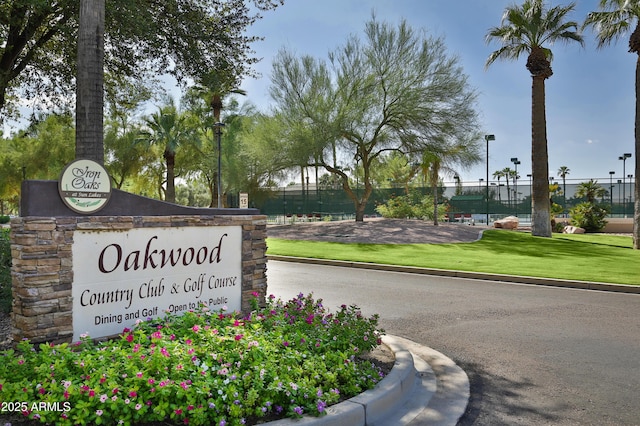 view of property's community featuring fence