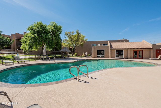 view of pool featuring a patio area