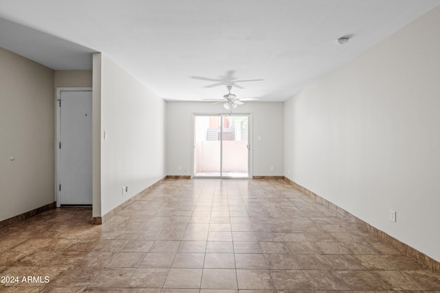 spare room featuring ceiling fan