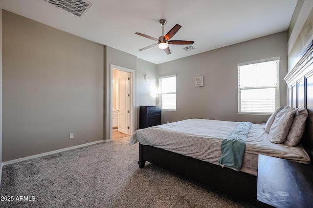 bedroom with visible vents, a ceiling fan, baseboards, and light carpet