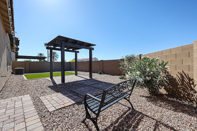 view of patio / terrace with central AC unit and a fenced backyard