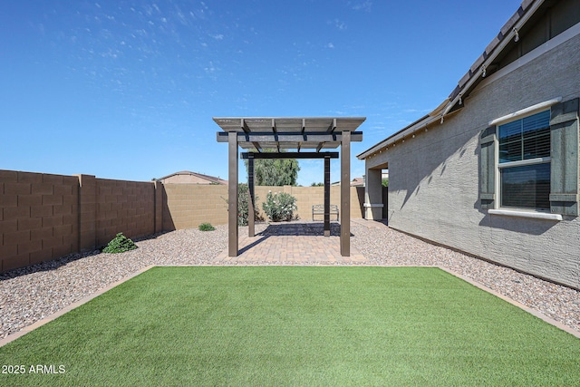 view of yard with a fenced backyard, a patio area, and a pergola