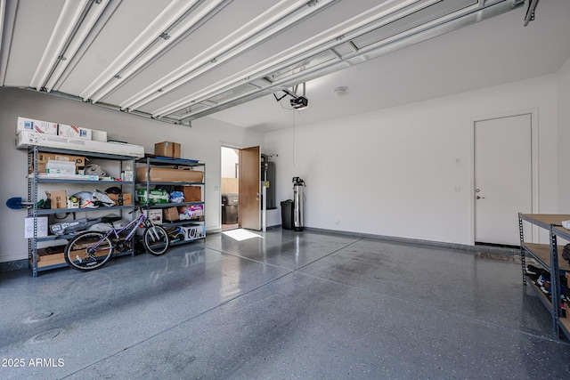 garage with baseboards and a garage door opener