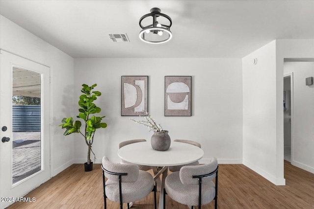 dining room featuring hardwood / wood-style flooring