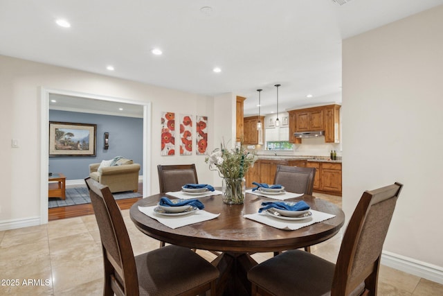 7042 N 13th St, Phoenix, AZ 85020 - dining room featuring recessed lighting, baseboards, and light tile patterned floors