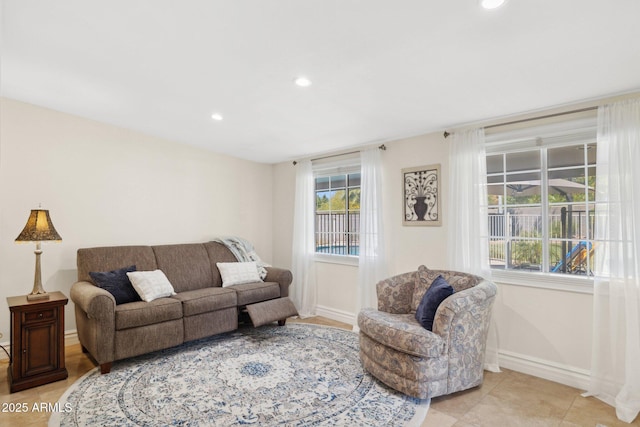 7042 N 13th St, Phoenix, AZ 85020 - living area featuring recessed lighting, baseboards, and light tile patterned flooring