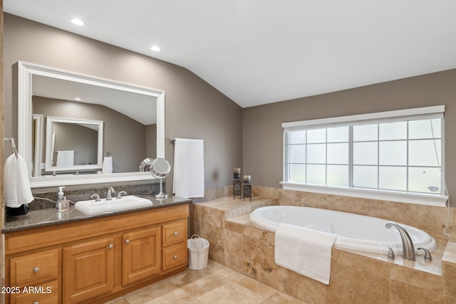 7042 N 13th St, Phoenix, AZ 85020 - bathroom featuring vanity, recessed lighting, a bath, and vaulted ceiling