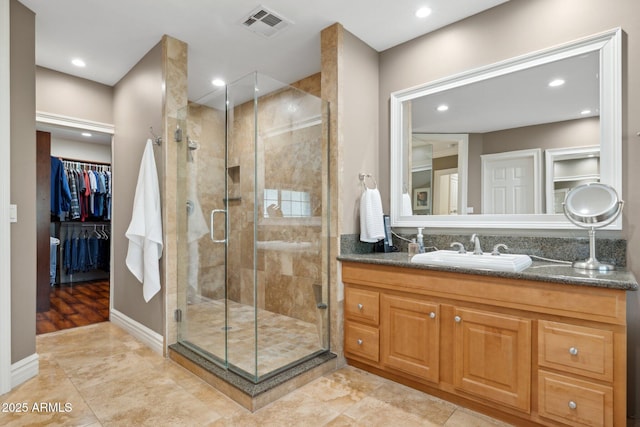 7042 N 13th St, Phoenix, AZ 85020 - bathroom with visible vents, recessed lighting, and a shower stall