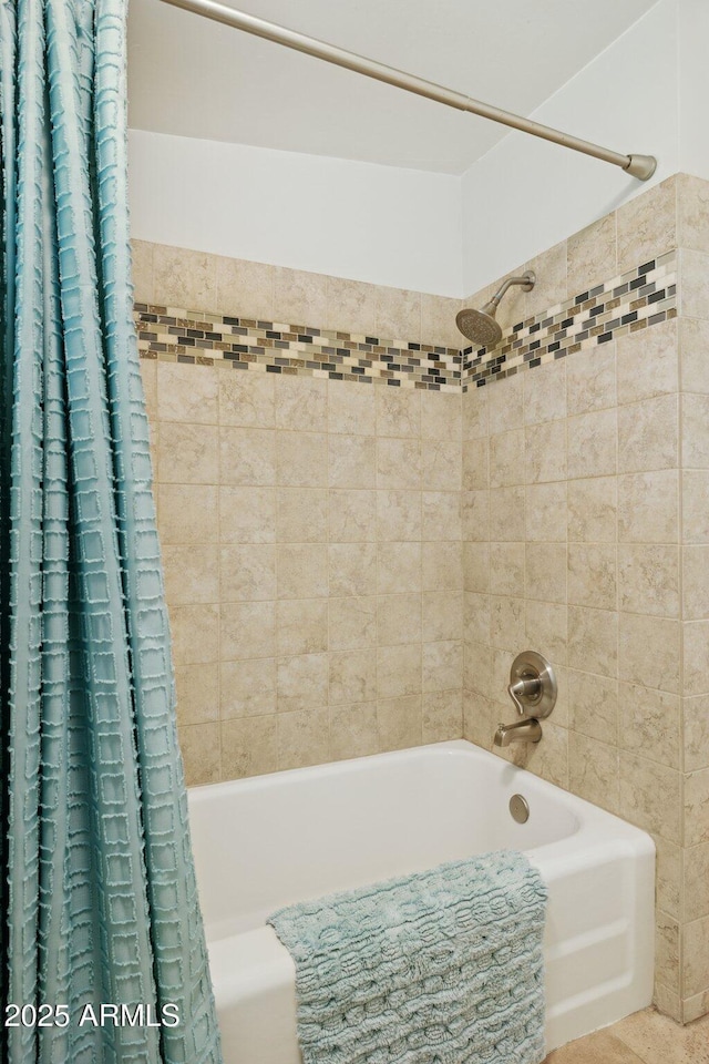 7042 N 13th St, Phoenix, AZ 85020 - bathroom featuring shower / bath combo with shower curtain