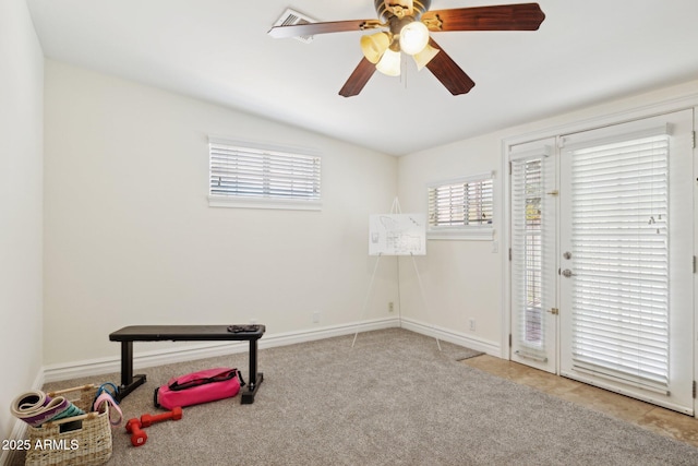 7042 N 13th St, Phoenix, AZ 85020 - workout area featuring baseboards, a ceiling fan, carpet, and vaulted ceiling