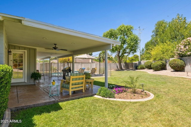 7042 N 13th St, Phoenix, AZ 85020 - view of yard featuring a patio, ceiling fan, and a fenced backyard