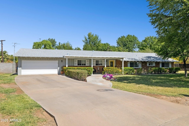 7042 N 13th St, Phoenix, AZ 85020 - single story home featuring board and batten siding, fence, a front lawn, concrete driveway, and an attached garage