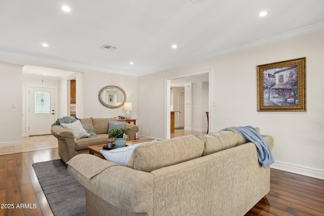 7042 N 13th St, Phoenix, AZ 85020 - living area with baseboards, ornamental molding, hardwood / wood-style floors, and visible vents