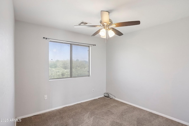 9420 S 35th Gln, Laveen, AZ 85339 - spare room with ceiling fan, carpet floors, and baseboards