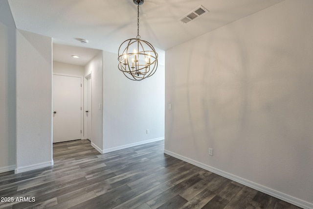 10101 N 91st Ave Unit 111, Peoria, AZ 85345 - unfurnished dining area featuring dark wood finished floors, baseboards, and a chandelier