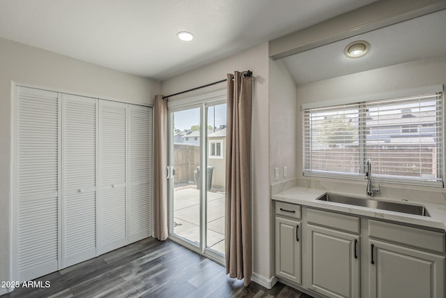 10101 N 91st Ave Unit 111, Peoria, AZ 85345 - kitchen with a sink, dark wood-style floors, light countertops, and recessed lighting