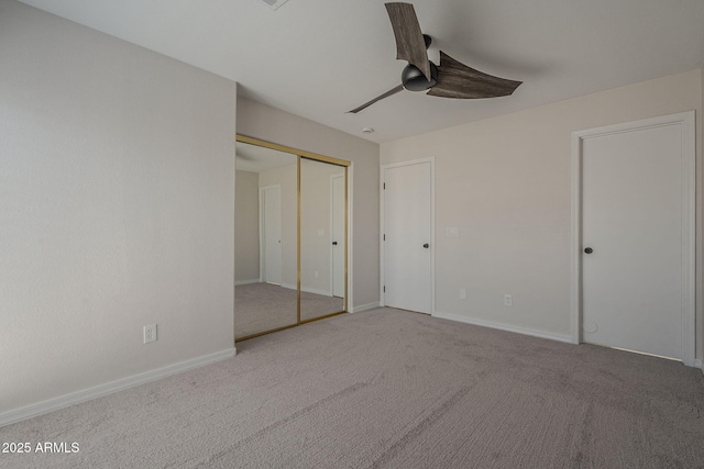 10101 N 91st Ave Unit 111, Peoria, AZ 85345 - unfurnished bedroom with carpet, baseboards, and a ceiling fan
