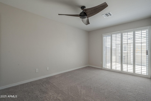 10101 N 91st Ave Unit 111, Peoria, AZ 85345 - empty room with carpet flooring, ceiling fan, and baseboards