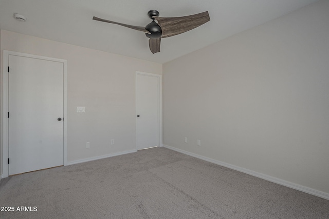 10101 N 91st Ave Unit 111, Peoria, AZ 85345 - empty room with a ceiling fan, carpet flooring, baseboards, and a smoke detector