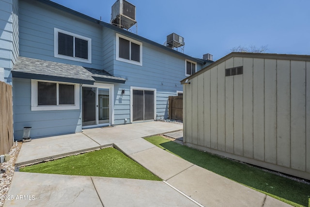10101 N 91st Ave Unit 111, Peoria, AZ 85345 - back of property with a patio area and central AC unit
