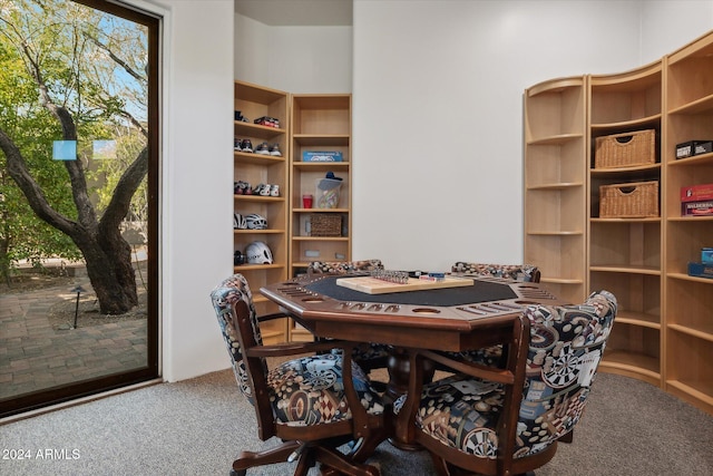 view of carpeted dining space