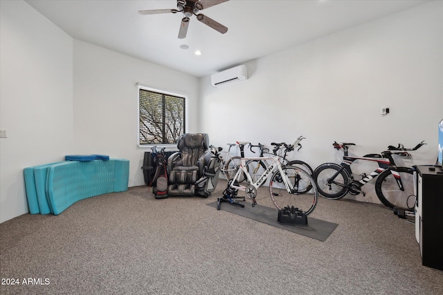 exercise room featuring carpet flooring, a wall unit AC, and ceiling fan