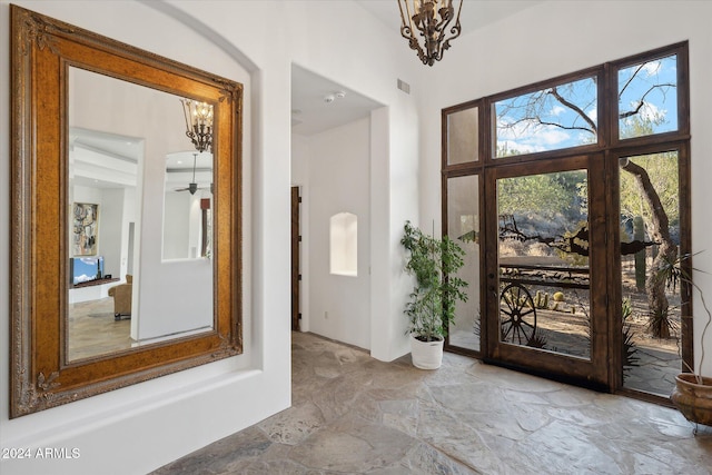 entryway featuring ceiling fan