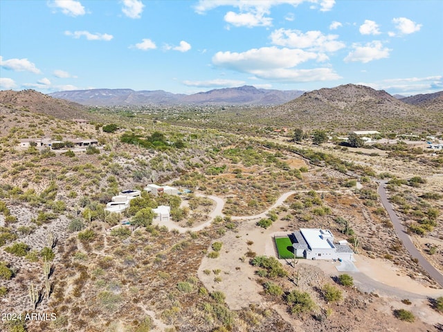 birds eye view of property featuring a mountain view