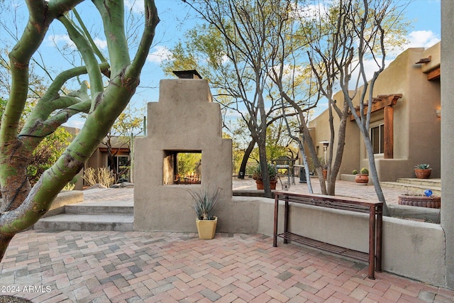 36600 N 50th St, Cave Creek, AZ 85331 - view of patio with a multi sided fireplace