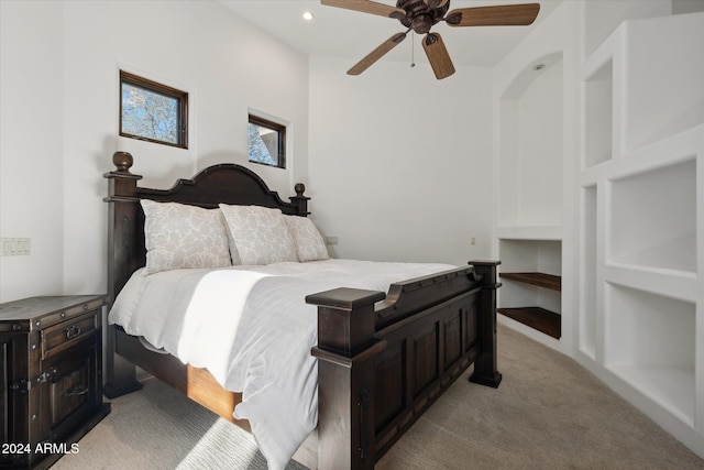 bedroom with light colored carpet and ceiling fan